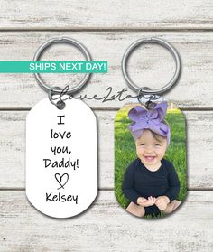 a keychain with the words i love you, daddy and kelsey on it