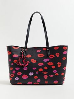 This stylish tote bag features an allover lip print, top handles, and a key tag. We made the arm strap a little longer for maximum comfort.   A bold, limited-edition collection that combines the pretty-meets-punk aesthetic of Betsey Johnson with Torrid’s. 14. 5” L x 5” W x 11” H. 11” top handle. Magnetic closure. Man-made materials. Imported. The best plus size women's betsey johnson black lips tote bag with heart tag handbags in multi. Torrid is your destination for the freshest spring and Knit Skater Dress, Lip Print, Betsey Johnson Handbags, Punk Aesthetic, Stylish Tote Bag, Black Lips, Heart Tag, Lips Print, Betsy Johnson