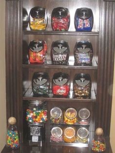 a wooden shelf filled with lots of candy