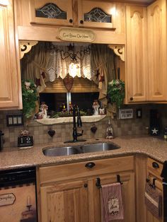 a kitchen with wooden cabinets and granite counter tops, an old fashioned stove top oven