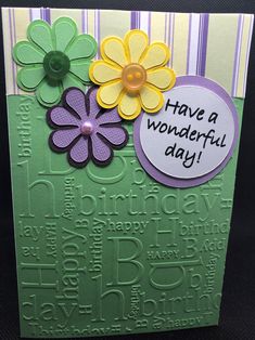 a greeting card with flowers and words on the front that says have a wonderful day