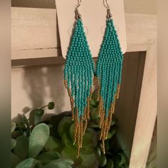 Beaded Earrings Turquoise Beaded Earrings With Dangling Beads For Festivals, Blue Earrings With Gold Beads, Turquoise Beaded Dangle Chandelier Earrings, Adjustable Beaded Turquoise Chandelier Earrings, Blue Beaded Earrings With Gold Beads For Festivals, Festival Turquoise Beaded Fringe Earrings, Turquoise Beaded Chandelier Earrings With Round Beads, Turquoise Dangling Beaded Earrings, Turquoise Earrings With Beaded Fringe