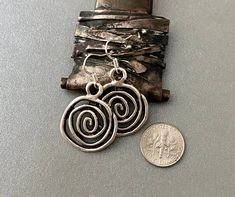 Modern and light weight. Love these awesome spirals! They go with anything...perfect gift for your pal gal Silvertone zinc alloy....lead and nickel free Sterling silver ear wires Gift boxed Thanks for stopping by - please see my shop for more genuine southwest designer jewelry! https://www.etsy.com/shop/ManyBeadsOfSedona Nickel Free Spiral Earrings For Everyday, Nickel-free Spiral Earrings For Everyday, Everyday Spiral Nickel-free Earrings, Everyday Nickel-free Spiral Earrings, Minimalist Spiral Nickel-free Jewelry, Minimalist Nickel-free Spiral Jewelry, Nickel-free Spiral Minimalist Earrings, Minimalist Spiral Nickel-free Earrings, Spiral Metal Jewelry With Oxidized Finish