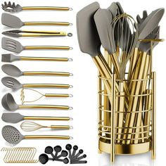 a set of kitchen utensils in a holder with gold handles and spoons