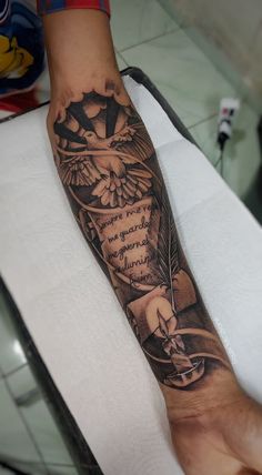 a person with a tattoo on their arm