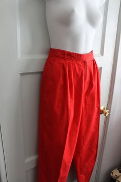 "Fabulous red pants. Perfect for riding High waist Pleated front Tapered leg Attached belt with snaps Front side pockets Label: Sallie Ross Measurements: Waist 26\" Hip 36\" Inseam 29\" Condition: Very good. No flaws noted" Red High Rise Vintage Bottoms, Retro Red Full Length Pants, Retro Red Cotton Pants, Vintage Red Full Length Pants, Vintage Red High-waisted Pants, Square Dance Dresses, Vintage Boy Scouts, Red Trousers, Lace Nightgown