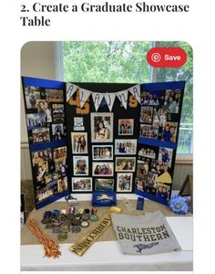 a table topped with pictures and other items next to a sign that reads, 2 create a graduate showcase table