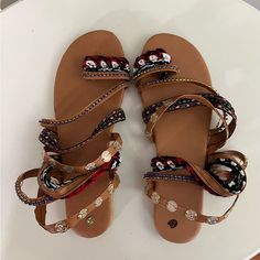 Size 8 Never Worn Bohemian Synthetic Sandals For Vacation, Bohemian Synthetic Sandals For Beach Season, Trendy Brown Sandals For Festival, Bohemian Flat Synthetic Sandals, Trendy Synthetic Sandals For Festivals, Trendy Multicolor Sandals For Festivals, Trendy Multicolor Festival Sandals, Women's Shoes Sandals, Shoes Sandals