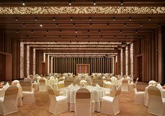 an empty banquet hall with tables and chairs