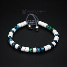 "top jewelry gifts for men and women, gifts for boyfriend, unique gifts ideasHandmade bracelet made with 6mm white, blue and green ceramic Mykonos beads. It's adjustable, utilizing a sliding knot made with macrame cord and is easy to put on and take off by yourself. Ceramic beads are handmade and have unique splatter paint art with vibrant colors. Please choose one of the 2 size options (For Men or Women) from dropdown menu. Men`s Size : 7\"- 8.5\" (18 cm -21 cm) Women`s Size: 6\"-7.5\" (16 cm - Spiritual White Heishi Beads Bracelets, White Hand Wrapped Stretch Bracelet With Round Beads, White Hand Wrapped Round Beads Stretch Bracelet, Spiritual White Friendship Bracelets For Beach, White Heishi Beads Round Bracelets, White Heishi Beads Round Beaded Bracelets, White Heishi Beads Bracelet, Elegant White Friendship Bracelets With Colorful Beads, Adjustable White Spiritual Bracelets