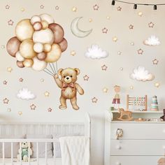 a teddy bear flying through the air with some balloons in it's mouth and stars on the wall