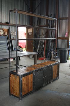 an industrial storage area with metal and wood furniture