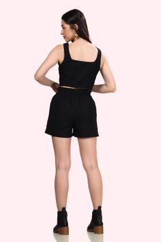 Description:This stylish coord set combines a structured crop top with matching high-waisted shorts for a sleek and cohesive look.The crop top features a flattering sweetheart neckline and functional button front, allowing for easy adjustment and a tailored fit.The high-waisted shorts complement the top with a zipper fly, functional top button, and decorative button detailing, along with side pockets for added convenience. The coordinated design offers a modern, streamlined silhouette that is bo Black Two-piece Crop Top For Summer, Summer Black Two-piece Crop Top, Solid Color Short Length Summer Sets, Solid Short Length Summer Sets, Summer Solid Color Short Sets, Crop Top With Built-in High-waisted Shorts, Spring Sets With Built-in Shorts, Spring Short Set, Spring Crop Top With Built-in High-waisted Shorts