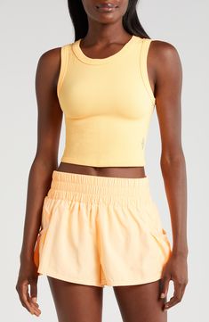 Perform at your best in this comfortable muscle tank designed with ribbed trim and a cropped length. 16" length (size M/L) Crewneck 87% polyamide, 13% elastane Machine wash, dry flat By Free People; imported Running Tops For Women, Sports Tops, Running Clothes Aesthetic, Activewear Tops, Fitted Workout Tops, Sports Tank Top, Free People Movement Outfit, Athletic Tops, Workout Clothes Outfits