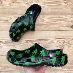 Brand New Crocs Classic Hemp Leaf Clog Color/Design: Black With Green Hemp Leaf Men’s Size 4 / Women’s Size 6 Men’s Size 5 / Women’s Size 7 Men’s Size 6 / Women’s Size 8 Men’s Size 7 / Women’s Size 9 Men’s Size 8 / Women’s Size 10 Men’s Size 9 / Women’s Size 11 Men’s Size 10 / Women’s Size 12 - Sold Out Men’s Size 11 Men’s Size 12 Men’s Size 13 Summer Streetwear Round Toe Clogs, Black Flat Clogs With Removable Insole, Casual Black Clogs With Flat Heel, Streetwear Closed Toe Clogs With Rubber Sole, Closed Toe Rubber Sole Clogs For Streetwear, Green Casual Clogs With Flat Heel, Rubber Sole Clogs For Streetwear, Green Flat Heel Casual Clogs, Casual Green Clogs With Flat Heel