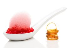 a spoon full of sugar and jelly on a white background stock photo - image 3479