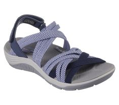 Comfort and breezy style makes a loving pair with Skechers Reggae Cup - Smitten By You. This vegan sling-back sandal features a strappy Stretch Fit fabric and synthetic upper with an adjustable ankle-strap closure, an Arch Comfort cushioned footbed, and a shock-absorbing midsole for added support. | Skechers Women's Reggae Cup - Smitten By You Sandals Adjustable Strappy Sport Sandals For Summer, Strappy Sport Sandals With Adjustable Strap For Summer, Summer Strappy Sport Sandals With Adjustable Strap, Summer Sport Sandals With Adjustable Strap And Strappy Design, Adjustable Strappy Sport Sandals With Removable Insole, Strappy Sport Sandals With Adjustable Strap For Beach, Beach Strappy Sport Sandals With Adjustable Strap, Synthetic Sport Sandals With Adjustable Straps, Adjustable Synthetic Sport Sandals