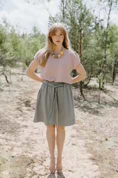 "PRODUCED in 3-5 days FAST & FREE shipping with DHL Express Courier -10% for all items with code \"FAVOURITE\" Feel the spells of nature in this belted mini skirt! Made from breathable linen in a sage green color it is easy to style and comfortable to wear. Details: - 100% Linen - Elastic waistband - Adjustable belt - Two side pockets - Flowy silhouette - Above knee length - Model's height is 172 cm / 5'7'' wears size M - Code: E4002-L532-303 The skirt is available in other colors. You can find them in the gallery. If you want to order the skirt in another color, please specify it in the personalization field. Sizing: This garment is true to size, and we recommend choosing the size you usually wear. If you want the garment to be loose-fitting, choose a larger size than you usually wear. Be Flowy Linen Mini Skirt, Spring Linen Mini Skirt In Relaxed Fit, Relaxed Linen Mini Skirt For Spring, Linen Mini Skirt With Relaxed Fit For Spring, Green Linen Skirt, Linen Mini Skirt, Artistic Ideas, Belted Mini Skirt, Skirt With Belt