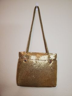 Beautiful gold metal sequin vintage purse. Looks to have never been used. Vintage Gold Shoulder Bag For Party, Gold Sequined Bags For Party, Gold Sequined Party Bag, Gold Sequin Party Bag, Glamorous Gold Shoulder Bag For Everyday Use, Gold Party Bags With Sequins, Elegant Gold Bags With Sequins, Elegant Gold Sequined Bags, Gold Retro Bags With Gold-tone Hardware