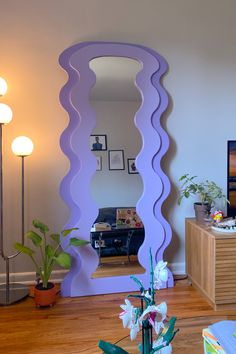 Tall wavy mirror. Purple curvy mirror. Funky mirror. Summer decor ideas Curvy Mirrors, Groovy Mirror, Funky Apartment Decor, Chill Apartment Vibes, Warm Apartment Aesthetic, Room Decor Maximalist, Chill Apartment, Pastel Room Aesthetic, Funky Apartment