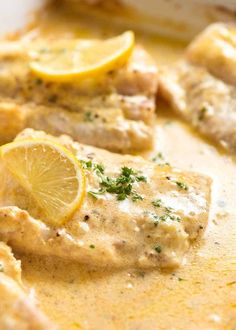 chicken with lemon sauce and parsley on top