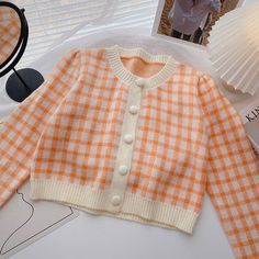 Round neck knitted cardigan in a pastel gingham pattern. Cropped length. S/M: 14" across shoulders, 33" chest, 15.5" length Rok Midi, College Outfits Women, School Outfit Women, Orange Outfit, Knit Outerwear, Long Sleeve Knit Tops, Women Sleeve, Japan Fashion, Cropped Cardigan