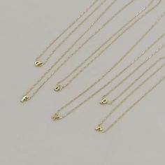 Our signature Initial Necklace just got a little sister and she just might be a little more popular. These Tiny Initial Necklaces are the perfect layering piece. Not sure about the whole initial trend? This a great way to test the waters before going all in! 14k gold filled chain and components Stainless steel with gold plating dainty initial charm ALL SALES FINAL ON SALE ITEMS Everyday Hypoallergenic 14k Gold Charm Necklace, Everyday Hypoallergenic Yellow Gold Charm Necklaces, Everyday Tiny Charm Necklaces In 14k Gold Filled, Everyday Tiny Charm Necklace In 14k Gold Filled, Gold Hypoallergenic Charm Necklaces For Everyday, Everyday Gold Hypoallergenic Charm Necklaces, Dainty 14k Gold-filled Name Necklace, Dainty 14k Gold Filled Name Necklace, Simple Tiny Gold Charm Necklace