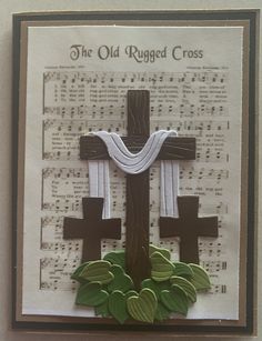 an old rugged cross is displayed on a sheet of music