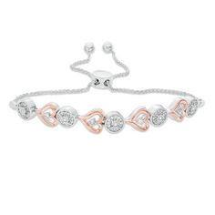 Take your look up a notch with this romantic diamond bolo bracelet. Crafted in sterling silver and 10K rose gold, this striking style features open rose gold hearts - centered with single diamonds artfully set to enhance size and sparkle - alternating with silver round diamond composites. Vibrant with 3/8 ct. t.w. of diamonds and a brilliant buffed luster, this wheat chain bracelet adjusts up to 9.5 inches in length and secures with a bolo clasp and ball ends. Open Rose, Bolo Bracelet, Gold Hearts, Rose Bracelet, Peoples Jewellers, Rose Gold Heart, Diamond Stone, Bracelet Designs, Sterling Silver Bracelets