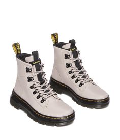 PRICES MAY VARY. Poly Twill is a lightweight polyester material woven together in a durable twill pattern that keeps the elements out. Brand DNA features such as yellow mock-welt stitch and branded heel loop​. Combs Poly Casual Boots, Twill Pattern, Dr Martens Style, Dr Martens Womens, Boots Combat, Polyvinyl Chloride, Kids Luggage, Ankle Bootie, Mode Fashion