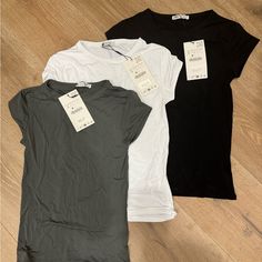 Brand New, Never Been Worn. Three Super Comfortable Zara Tees. The Material Is Very Stretchy And Breathable, And Could Even Be Worn For Working Out. Zara Basic Stretch T-shirt, Trendy Stretch Tops From Zara, Zara Stretch Crew Neck T-shirt, Zara Black Basic Tops, Zara Basic Black Tops, Long T Shirts, T Shirts Women, Long T, Zara White