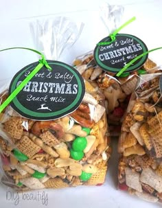 three bags of christmas snack mix sitting next to each other