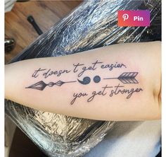 a woman's arm with an arrow and two arrows that say it doesn't get easier, you get longer