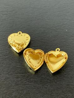 "2 gold tone or silver tone heart shaped locket, heart locket, heart locket gold, heart locket silver, locket heart, gold heart locket, small heart locket Scroll design. ★ Pendant Size: 7/8\" L X 3/4\" W. ★ More pendants, charms, beads, jewelry making supplies and buttons available at https://www.etsy.com/shop/ElevenWestDesigns" Gold-plated Heart Charm Locket Necklace As A Gift, Gold Heart-cut Locket Necklace For Gift, Heart-shaped Locket Necklace For Keepsakes, Heart Shaped Brass Locket Necklace, Heart-shaped Brass Locket Necklace For Gifts, Gold Heart Locket, Scroll Design, Silver Lockets, Heart Locket