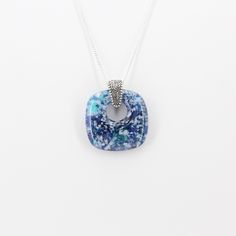 This blue glass pendant has amazing depth! Speckles of blue, white, and turquoise embedded in clear glass. Bail - silver plated bronze20 inch Chain - silver plated stainless steel Electroformed Jewelry, Green Bottle, Chain Silver, Recycled Glass, Glass Pendant, Glass Jewelry, Glass Pendants, For The Home, Blue Glass