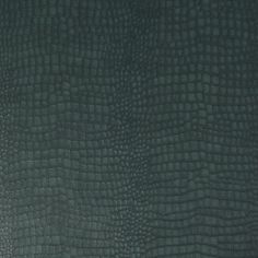 the texture of an alligator skin leather background