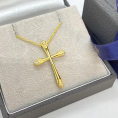 MELIGreece's 18k yellow gold cross-pendant with dynamic design with round-shaped edges covered with diamonds weighing 0.10 cts., tied on a 18k yellow gold chain. This 18k solid gold diamond cross necklace is an ideal gift for an Orthodox Christian baptism: All Orthodox Christians are given a cross to wear after baptism. Babies and adults who are baptized and converted to the Orthodox Christian Church receive a blessed golden cross that is worn around their necks from the time of their Baptism un Yellow Gold Diamond Cross Necklace Gift, Diamond Cross Necklace In Yellow Gold As Gift, Gold Diamond Cross Necklace Gift, Gold Diamond Cross Necklace As Gift, Christian Baptism, Diamond Cross Necklace Gold, Rose Gold Chain Necklace, Golden Cross, Easter Jewelry