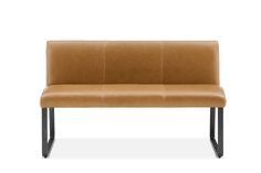 a brown leather bench sitting on top of a metal frame