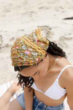 Level up your look with this multicolored, ultra-versatile bandana. Crafted from soft, breathable fabric, this bandana is adorned with whimsical paisley and floral prints. It can be braided into your hair, tied around your neck, or used to accessorize your tote bag—the possibilities are endless! Material: 100% Modal Length: 21" Width: 21" Made In India Summer Vacation Bandana, Spring Beach Bandana Headband, Beach Bandana As Headband, Bohemian Bandana For Spring Vacation, Summer Beach Bandana Bandeau, Summer Beach Bandeau Bandana, Summer Festival Hair Accessories: Headband, Festival Headwrap Headband, Summer Festival Hair Accessories Headband