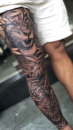 a man with a tiger tattoo on his arm