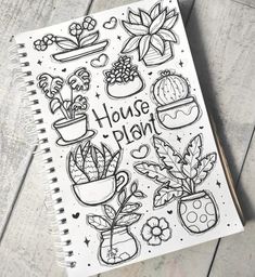 a notebook with some drawings on it and the words house plant written in black ink