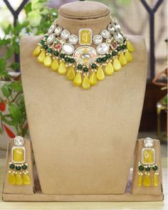 Sabyasachi inspired Kundan Polki Choker necklace of Beads with matching earrings Perfect for any kind of occasions and ceremonies. You can wear it with Saree lehenga and Evening Gowns. Highest quality and craftsmanship. Arrives in box Please let me know if you have any questions Yellow Meenakari Jewelry For Wedding, Yellow Cutdana Jewelry For Wedding, Designer Multicolor Jewelry For Weddings, Traditional Yellow Necklaces For Weddings, Designer Wedding Necklaces For Festive Occasions, Traditional Yellow Necklace For Wedding, Designer Festive Wedding Necklaces, Traditional Yellow Wedding Necklace, Yellow Kundan Necklace For Wedding