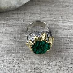 Natural malachite ring in sterling silver and gold. It is gold plated around the stone. This ring is the perfect gift for unique and modern girls and women. All our jewelry is made of high-quality sterling silver and is stamped with a 925 stamp 【FULL DETAILS】 Gemstone: Natural raw malachite SIZE: any size available (choose from the option) WEIGHT: approx. 15 gr (0.03pounds) Stone Diameters: 16 mm (0.62 inches) The height from the finger: 12 mm (0.47 inches) ⦿ Attention: The color of the stones m Gold Sterling Silver Rings With Natural Stones, Spiritual May Birthstone Ring, Unique Crystal Open Ring With Stone Setting, Spiritual Emerald Ring With Natural Stones For Gift, Gold Emerald Ring With Gemstone In Sterling Silver, Spiritual Sterling Silver Ring With Raw Stone, Spiritual Gold Emerald Ring With Gemstone, Spiritual Gold Emerald Ring, Gold Sterling Silver Rings With Large Stone