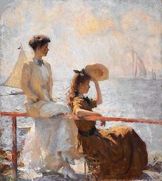 two women sitting on a boat in the ocean, one holding an umbrella and the other wearing a hat