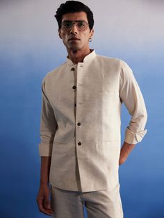 SHVAAS By VASTRAMAY Men's Cream Pure Cotton Nehru Jacket Classic Nehru Jacket With Stand Collar For Festive Occasions, Festive Nehru Jacket For Workwear, Festive Classic Nehru Jacket With Stand Collar, Casual Fitted Nehru Jacket With Pockets, Traditional Nehru Jacket For Spring Workwear, Festive Long Sleeve Nehru Jacket For Work, Traditional Bandhgala With Stand Collar For Spring, Casual Fitted Nehru Jacket For Spring, Traditional Fitted Nehru Jacket With Pockets