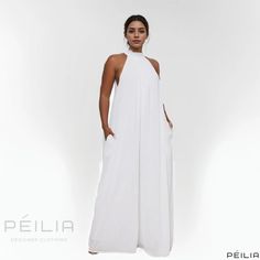 Peilia - Classic Solid Color Relaxed Fit Jumpsuit in Chiffon Summer Evening Jumpsuits And Rompers With Halter Neck, Summer Evening Halter Neck Jumpsuits And Rompers, Chic Flowy Jumpsuits And Rompers For Party, Chic Flowy Jumpsuits For Party, Chic Sleeveless Flowy Jumpsuits And Rompers, Chic White Halter Neck Jumpsuits And Rompers, White Halter Neck Jumpsuits And Rompers For Vacation, White Halter Neck Jumpsuit For Vacation, Elegant Halter Neck Jumpsuits And Rompers For Beach