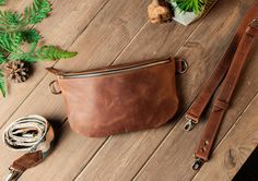 Genuine Leather Unisex Fanny Pack - Stylish and Versatile Sizes Available: S: 20x10x2.5 cm [7.8x4x1"] M: 25x15x5 cm [9.8x6x2"] L: 29x17x5 cm [11.5x6.7x2"] Adjustable Belt Lengths: S/M, M/L, L/XL Choose Your Style: Available in 10 colors, this leather fanny pack offers both functionality and style for any occasion. Optional Ornament Strap: Customize your look with a stylish decorative strap or keep it sleek and minimal. Personalization Available: Make it uniquely yours with personalized options l Hands Free Bag, Leather Hip Bag, Leather Waist Bag, Leather Fanny Pack, Belt Length, Leather Belt Bag, Everyday Accessories, Hip Bag, Bag Travel