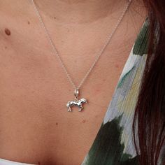 Capture the spirit of freedom with our stunning sterling Silver Horse Charm Necklace. Crafted from high-quality recycled 925 Sterling Silver, this exquisite piece features a beautifully detailed 3D horse charm, hand-finished to perfection. Perfect for horse lovers or as a thoughtful gift. Elevate your style with this timeless and elegant necklace.   All our charms attach with a clip-on clasp and are compatible with all other leading charm jewellery brands. Simply clip-on or slide-on to a chain, 3d Horse, Goddess Jewelry, Horse Necklace, Silver Horse, Horse Jewelry, August Birthstone Jewelry, July Birthstone Jewelry, Horse Lovers, Elegant Necklace