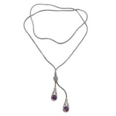 Like the teardrops from a goddess intricate designs in sterling silver frame two round gemstones of faceted amethyst. Balinese artisan Suar Dwipayana designs this lariat necklace which adorns the wearer on sterling naga chain that adjusts with a slider. Bohemian Lariat Jewelry For Formal Occasions, Silver Lariat Gemstone Jewelry, Silver Gemstone Lariat Jewelry, Silver Lariat Jewelry With Gemstone, Adjustable Teardrop Lariat Necklace For Formal Occasions, Adjustable Silver Lariat Necklace With Gemstone, Silver Gemstone Lariat Necklace In Sterling Silver, Silver Teardrop Lariat Necklace For Formal Occasions, Sterling Silver Lariat Necklace With Gemstone