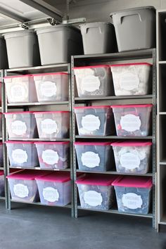 several bins with labels on them are lined up in a storage area, and one is filled with plastic containers